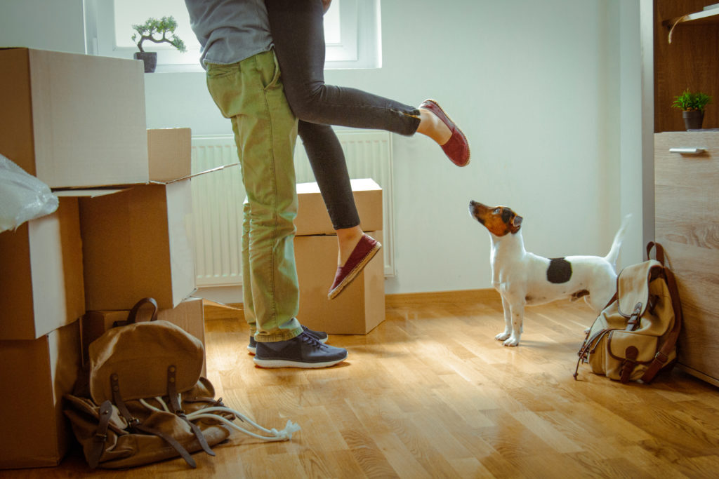 A couple celebrates moving into their new built home